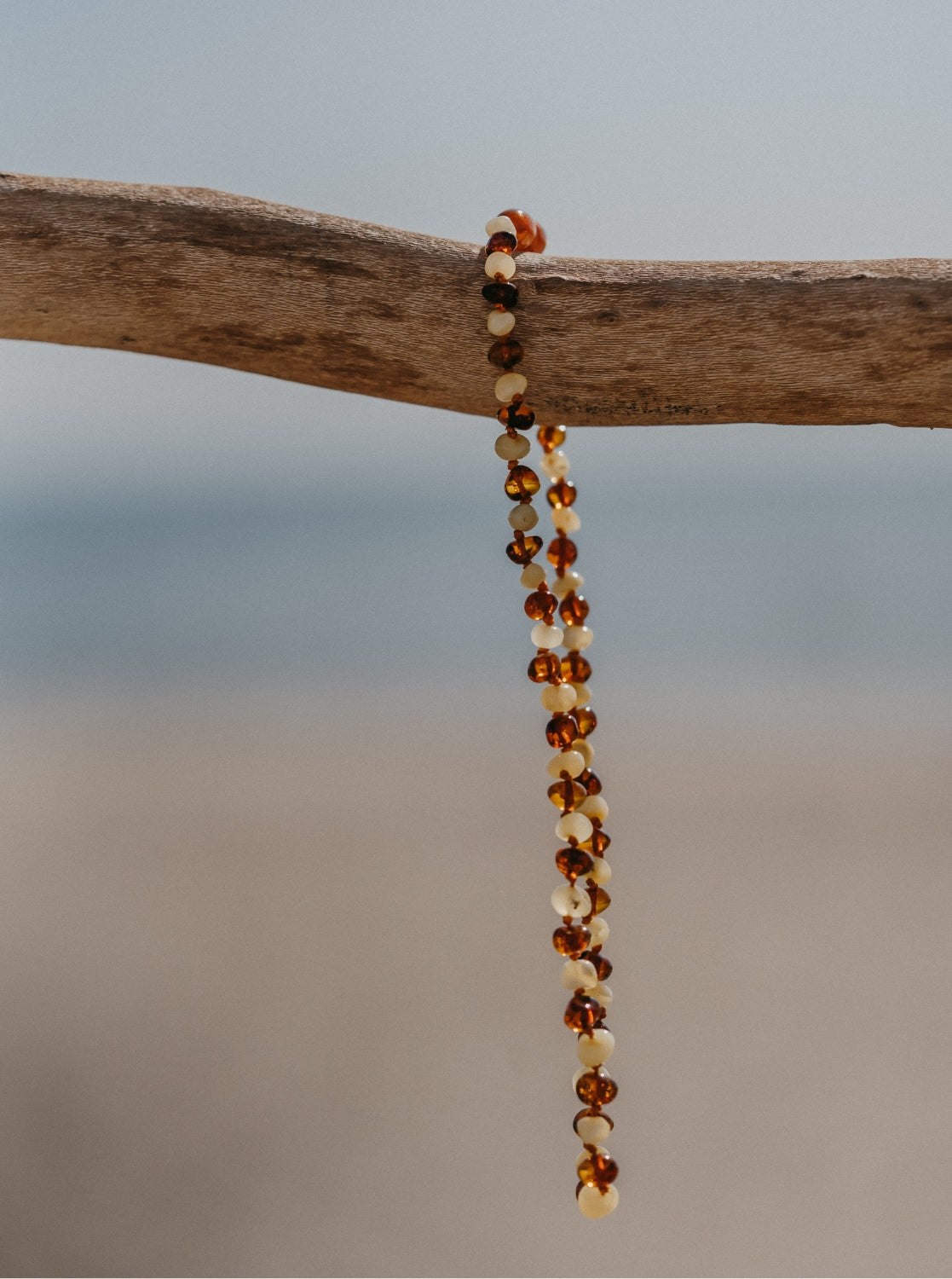 Collier, caramel/lait